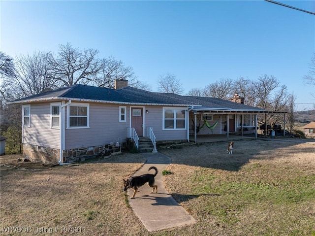 ranch-style home with a front yard