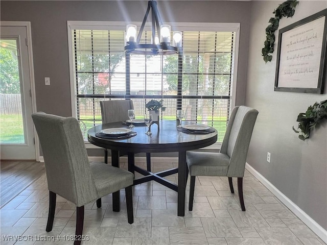 801 Northview Dr, Van Buren, AR 72956 - dining space with a chandelier and baseboards