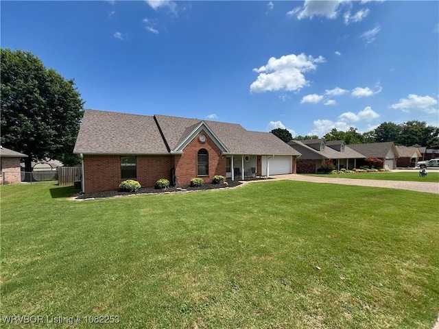 801 Northview Dr, Van Buren, AR 72956 - view of front of house with an attached garage, driveway, brick siding, and a shingled roof