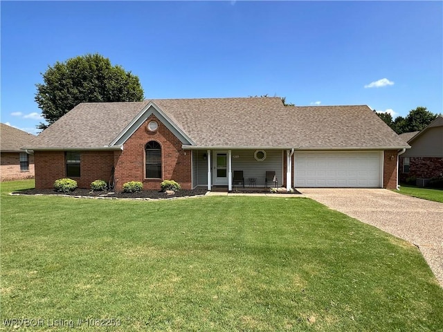 801 Northview Dr, Van Buren, AR 72956 - single story home with a garage, a front lawn, driveway, brick siding, and covered porch