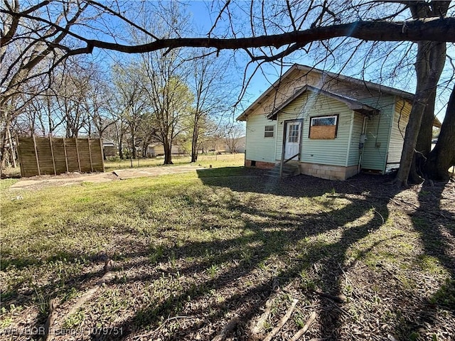 view of yard featuring entry steps