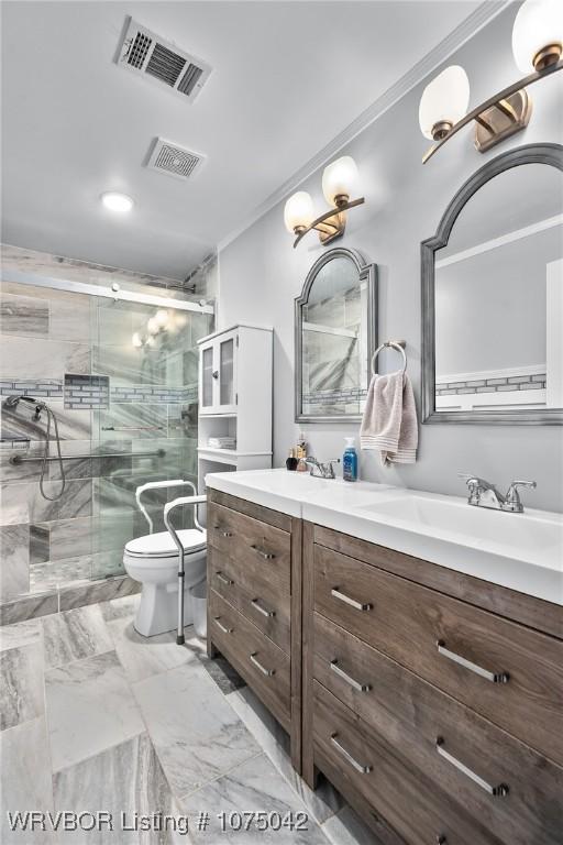 bathroom with vanity, toilet, walk in shower, and ornamental molding