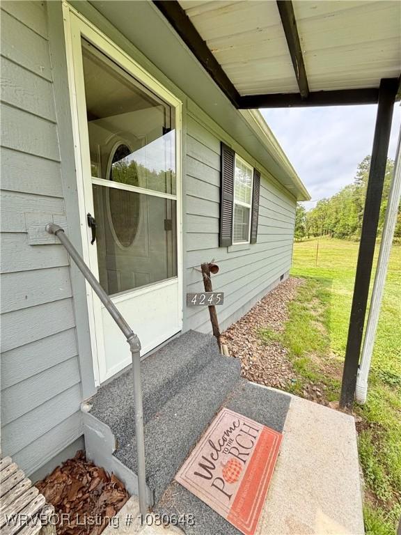 4245 W Piney Mountain Rd, Waldron, AR 72958 - view of patio / terrace with entry steps