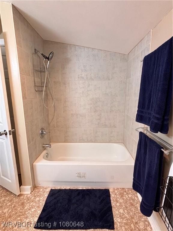 4245 W Piney Mountain Rd, Waldron, AR 72958 - bathroom with shower / tub combination and tile patterned flooring