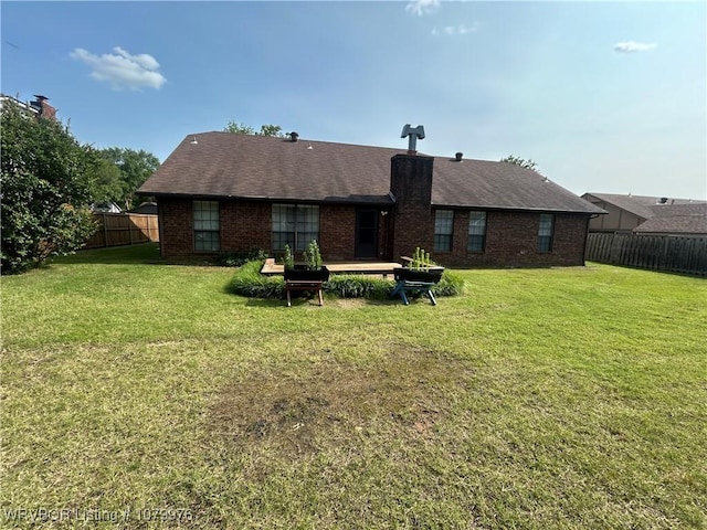 2205 Crosshill Rd, Fort Smith, AR 72908 - rear view of house featuring brick siding and a chimney