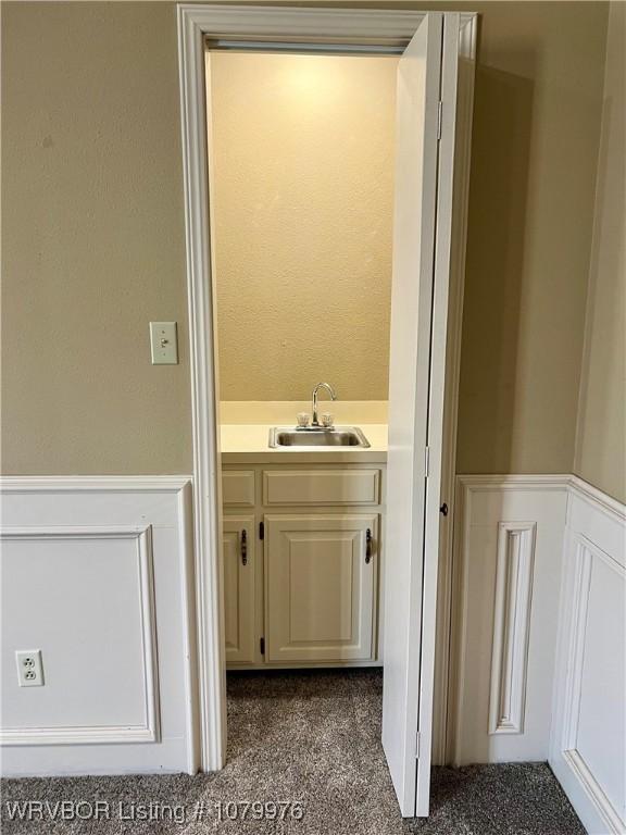 2205 Crosshill Rd, Fort Smith, AR 72908 - bathroom featuring vanity and wainscoting