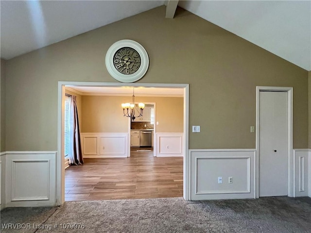 2205 Crosshill Rd, Fort Smith, AR 72908 - spare room featuring a chandelier, high vaulted ceiling, a wainscoted wall, a decorative wall, and carpet