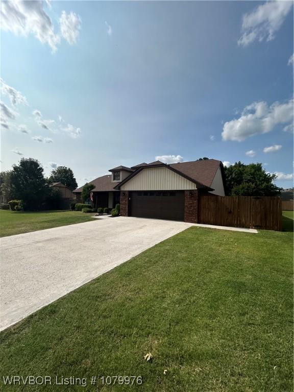 2205 Crosshill Rd, Fort Smith, AR 72908 - view of front of property with an attached garage, concrete driveway, and brick siding