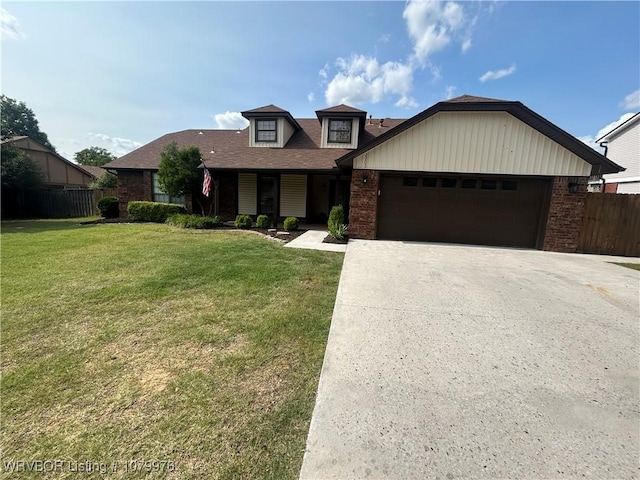 2205 Crosshill Rd, Fort Smith, AR 72908 - view of front of property featuring an attached garage, driveway, and brick siding