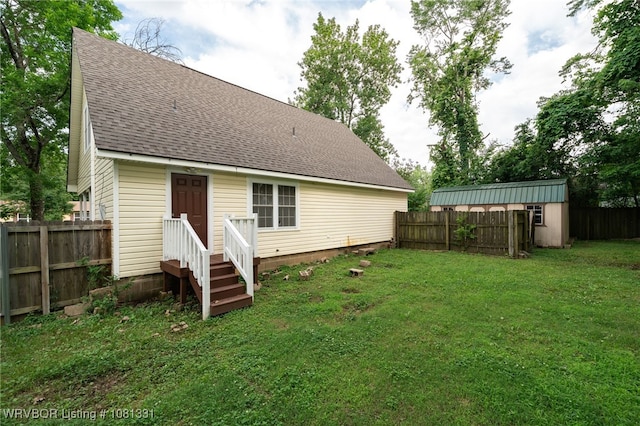 505 7th St, Barling, AR 72923 - rear view of property with a shingled roof