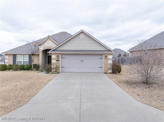 single story home featuring a garage