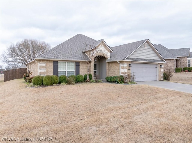 ranch-style home featuring a garage