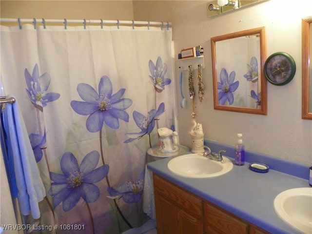 306 Crestview Dr, Van Buren, AR 72956 - bathroom with double vanity and curtained shower