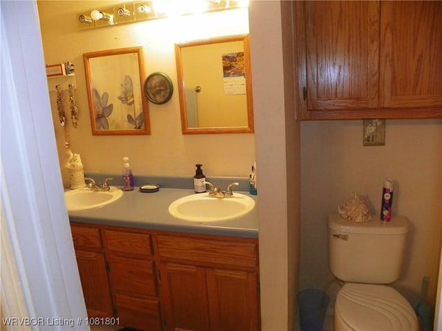 306 Crestview Dr, Van Buren, AR 72956 - bathroom with double vanity and toilet