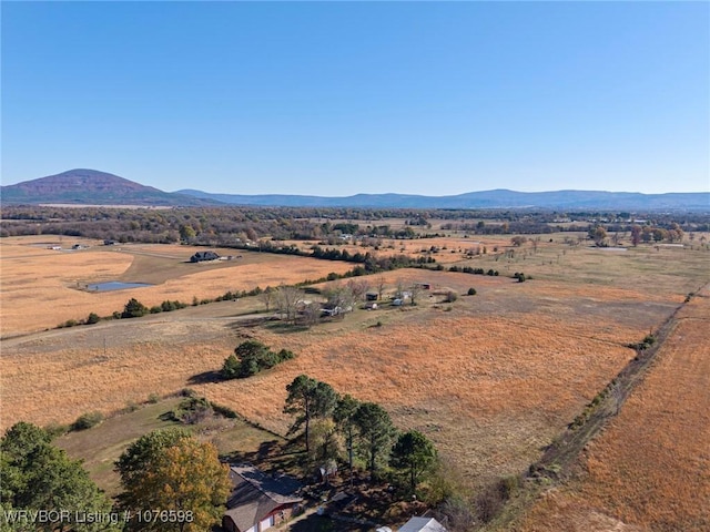 aerial view featuring a mountain view and a rural view