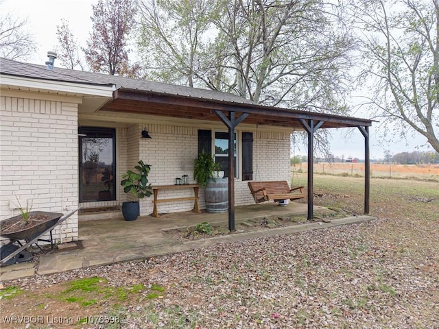 back of house featuring a patio area