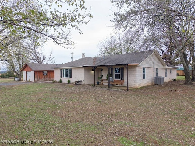 single story home featuring cooling unit