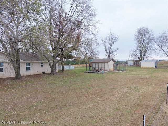 view of yard with a storage shed