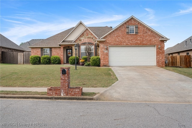 front of property with a front yard and a garage