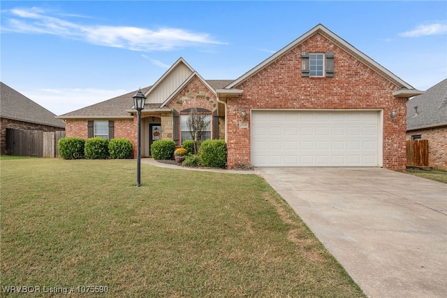 front of property with a garage and a front lawn