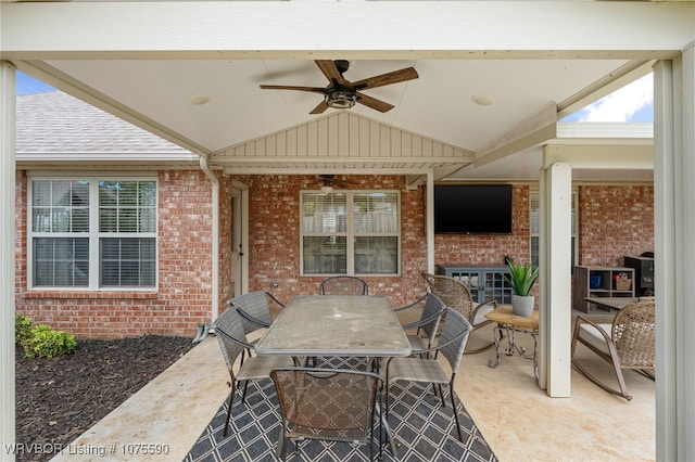 view of patio featuring ceiling fan