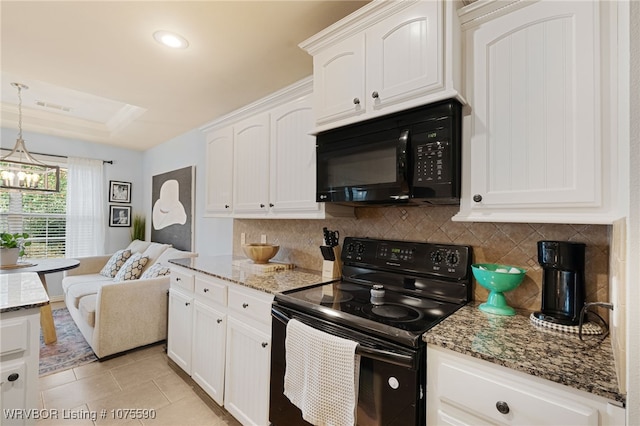 kitchen with decorative backsplash, black appliances, white cabinets, hanging light fixtures, and light tile patterned flooring