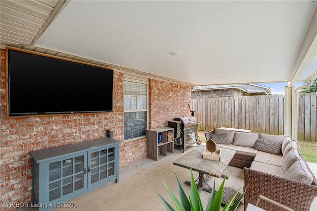 view of patio featuring area for grilling, an outdoor living space, and french doors