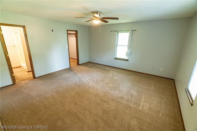 8617 S 15th St, Fort Smith, AR 72908 - unfurnished room with light colored carpet, a ceiling fan, and a textured ceiling