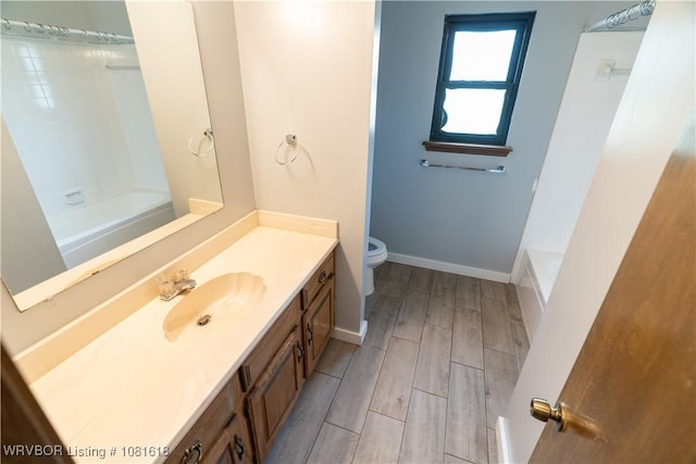 8617 S 15th St, Fort Smith, AR 72908 - bathroom with vanity, wood tiled floors, and  shower combination