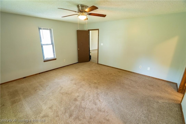 8617 S 15th St, Fort Smith, AR 72908 - unfurnished room featuring carpet floors, a ceiling fan, and a textured ceiling