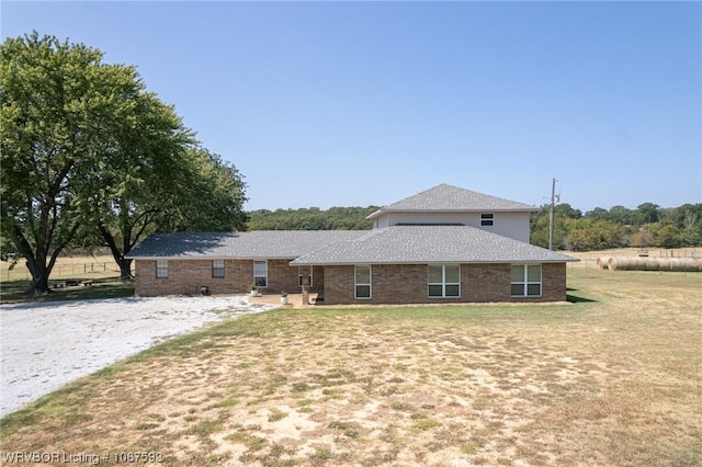 exterior space featuring a lawn