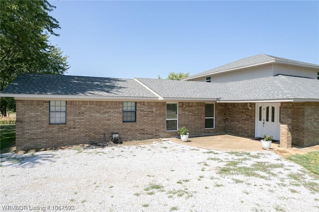 back of property with a patio area