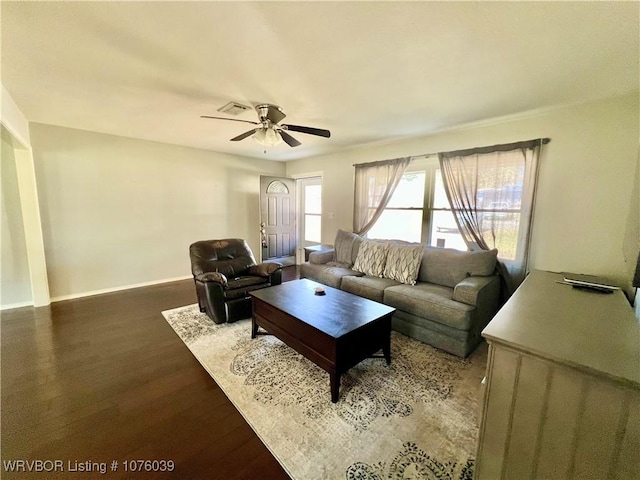 living room with hardwood / wood-style floors and ceiling fan