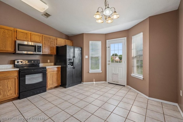 3707 Princeton Ct, Van Buren, AR 72956 - kitchen with black appliances, light countertops, a chandelier, vaulted ceiling, and light tile patterned floors