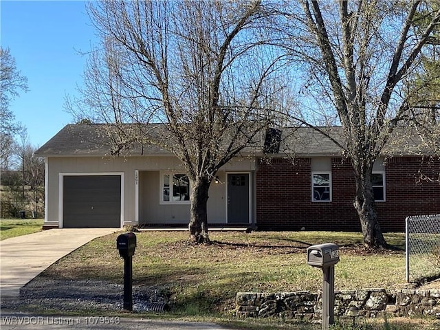 single story home featuring a front lawn, an attached garage, brick siding, and driveway