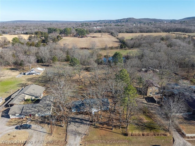 birds eye view of property featuring a rural view