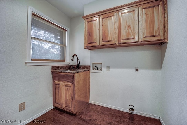 washroom featuring sink, cabinets, electric dryer hookup, dark hardwood / wood-style floors, and hookup for a washing machine