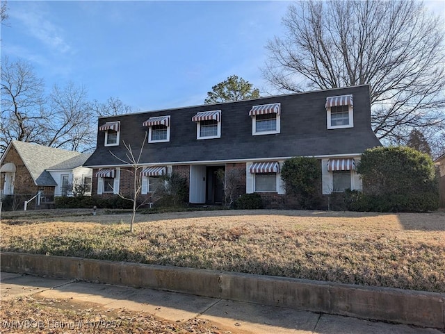 view of front of property with brick siding