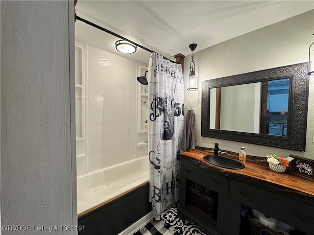 469497 975th Rd, Sallisaw, OK 74955 - full bathroom with a textured wall, shower / tub combo with curtain, and vanity