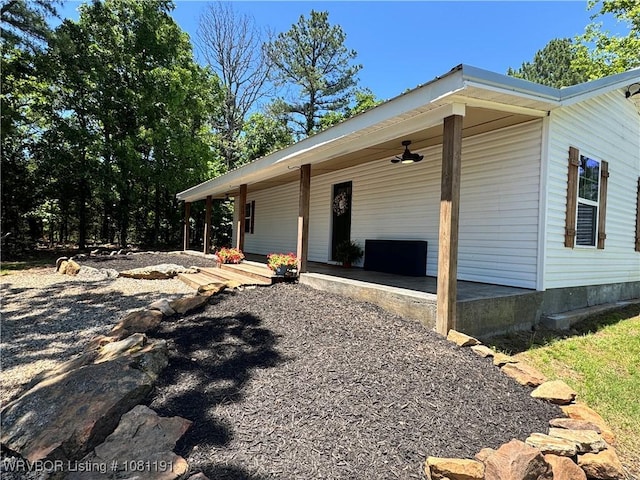 469497 975th Rd, Sallisaw, OK 74955 - view of property exterior featuring a porch