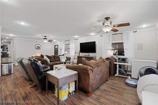 living area featuring visible vents, ceiling fan, wood tiled floor, ornamental molding, and recessed lighting