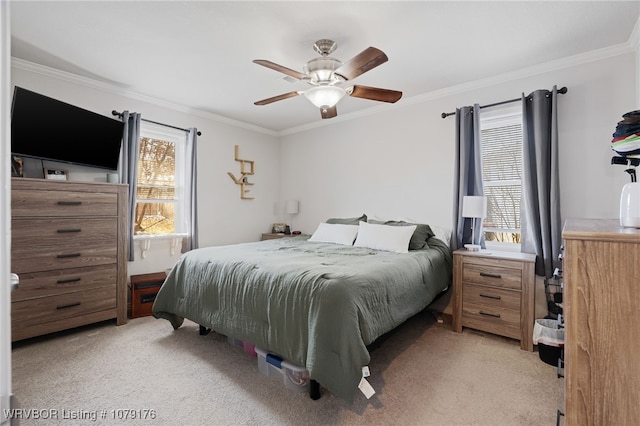 bedroom featuring ceiling fan, light carpet, and ornamental molding