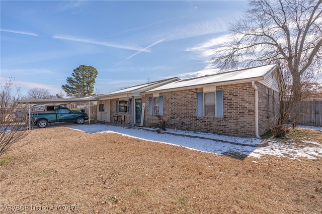 ranch-style house with brick siding