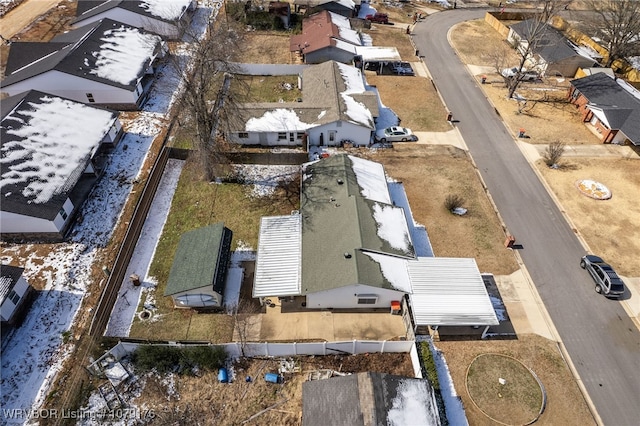 birds eye view of property with a residential view