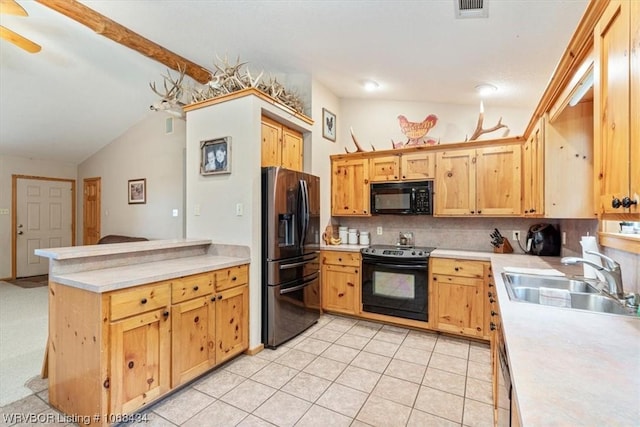 kitchen featuring black appliances, sink, vaulted ceiling with beams, light tile patterned floors, and tasteful backsplash