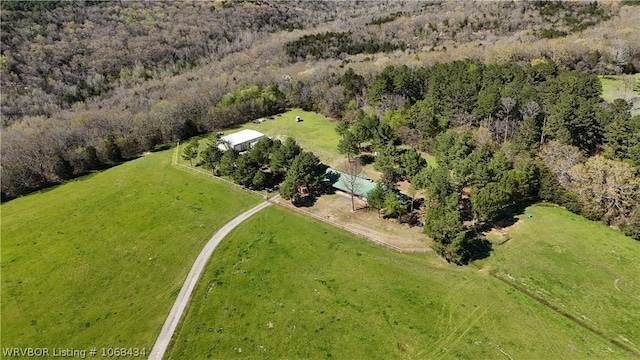 birds eye view of property with a rural view