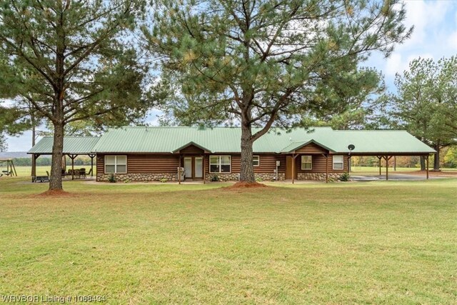 log home with a front lawn