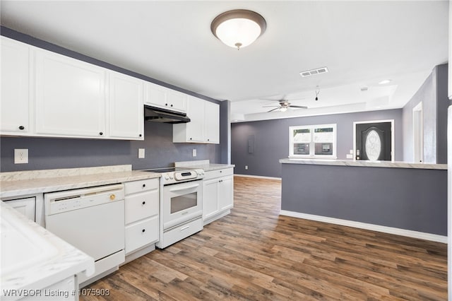 kitchen featuring ceiling fan, white cabinets, dark wood-type flooring, and white appliances