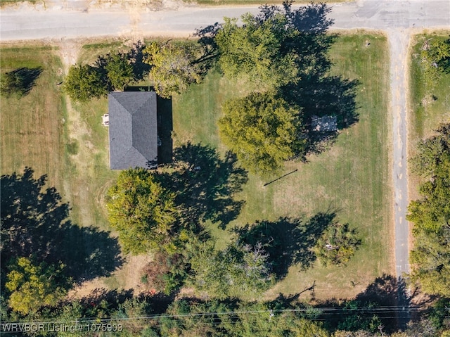 birds eye view of property with a rural view