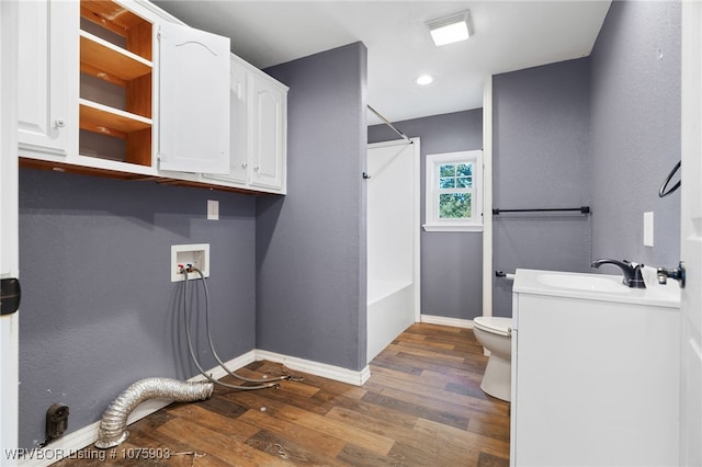 full bathroom with wood-type flooring, vanity, toilet, and shower / tub combination